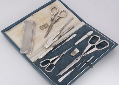 Lot 376 - A nice Art Deco period French silver cased sewing set retailed through Harrods
