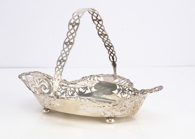 Lot 403 - A George V silver swing handled dish from Goldsmiths & Silversmiths