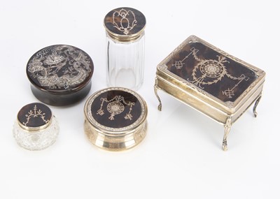 Lot 416 - An Edwardian silver and tortoiseshell pique work trinket box and circular box by William Comyns