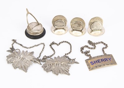 Lot 422 - Three silver decanter labels and four place name holders