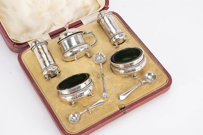 Lot 443 - A cased George V silver five piece cruet set