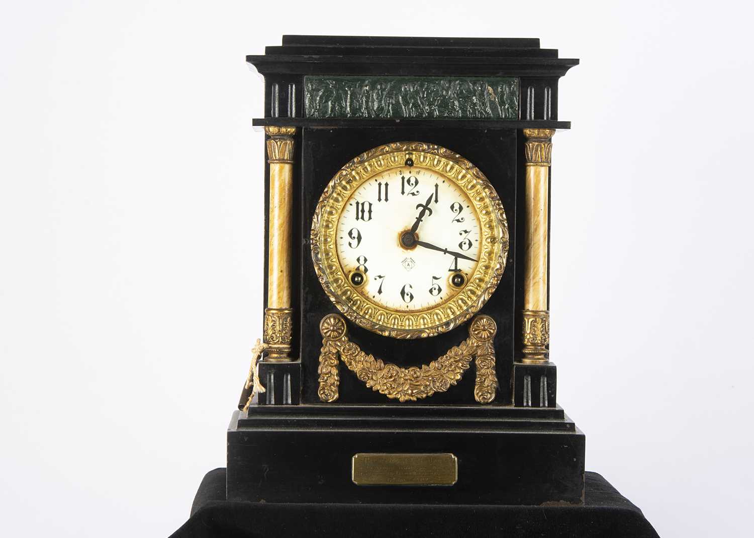 Lot 7 - An American late 19th century or early 20th century slate mantle clock