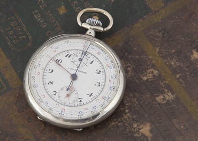 Lot 55 - An early 20th century silver pocket watch with stop watch facility