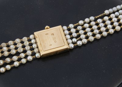 Lot 89 - A 1980s Chanel Madamoiselle 18ct gold and pearl quartz wristwatch