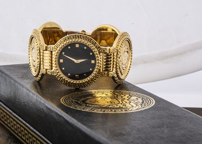 Lot 107 - A modern Gianni Versace gold plated wristwatch