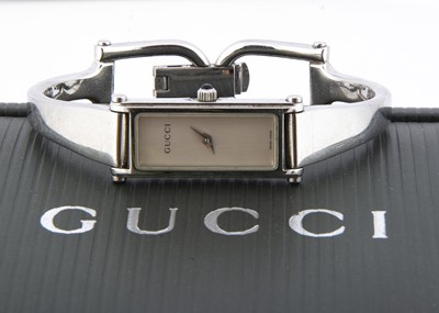 Lot 117 - A modern Gucci quartz stainless steel wristwatch