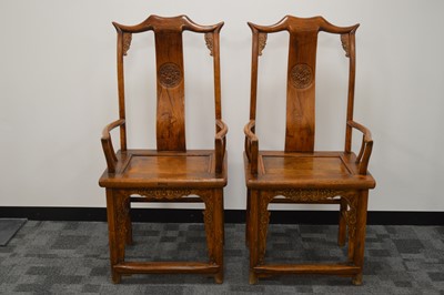 Lot 7 - A pair of impressive Chinese hardwood marriage armchairs