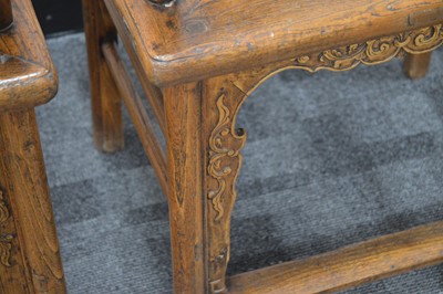 Lot 7 - A pair of impressive Chinese hardwood marriage armchairs