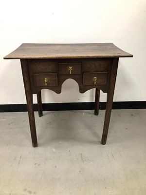Lot 16 - A small 18th century and later oak lowboy