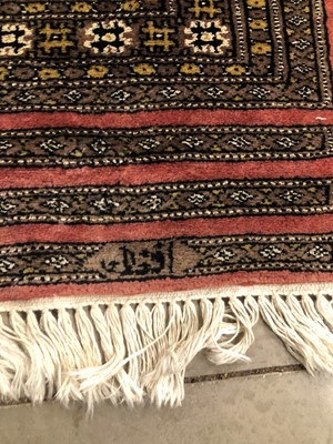 Lot 30 - A signed Persian woollen rug