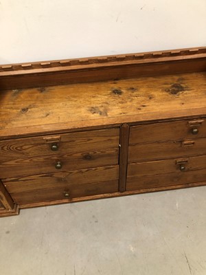 Lot 37 - An Edwardian ecclesiastical pitch pine cabinet