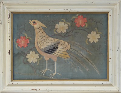 Lot 72 - A decorative embroidered framed picture of a peacock