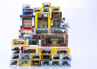 Lot 555 - Bachmann and Scenix 00 Gauge Buildings and various makers vehicles