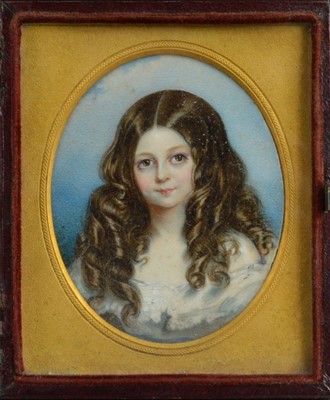 Lot 132 - A late 19th century portrait miniature on ivory of a girl