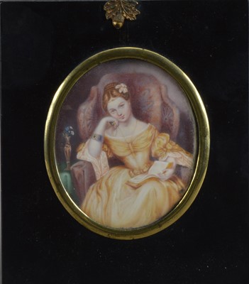 Lot 136 - A 19th century Portrait miniature on ivory of a seated  young lady
