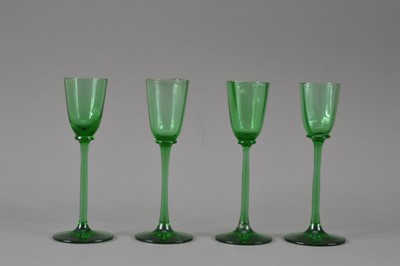 Lot 182 - A set of four Art Deco period continental green glass liquor glasses