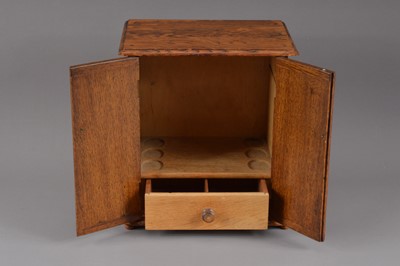 Lot 186 - A circa 1930's oak smokers cabinet