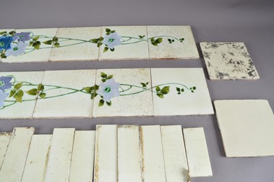 Lot 195 - A collection of Edwardian fireplace tiles