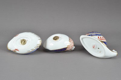 Lot 201 - Three Royal Crown Derby bone china paperweights