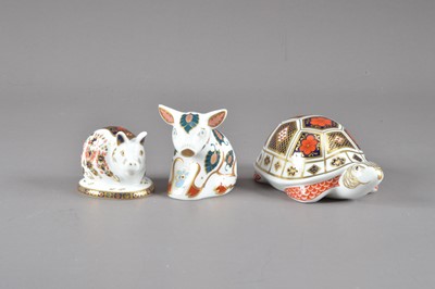 Lot 205 - Three Royal Crown Derby bone china paperweights