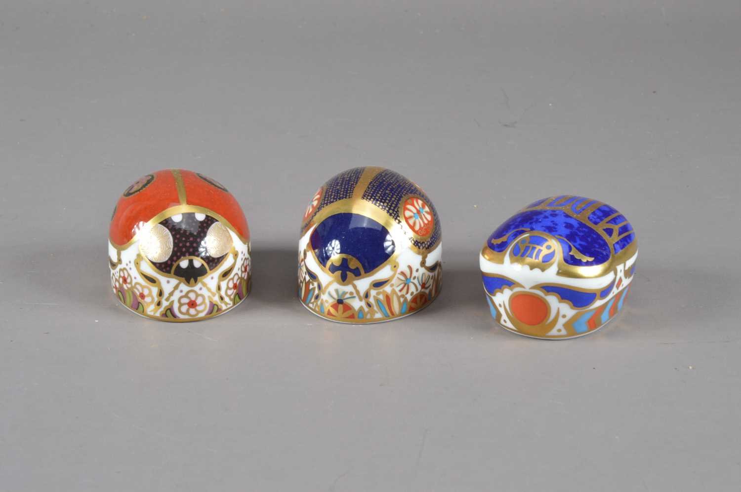 Lot 206 - Three bug Royal Crown Derby bone china paperweights