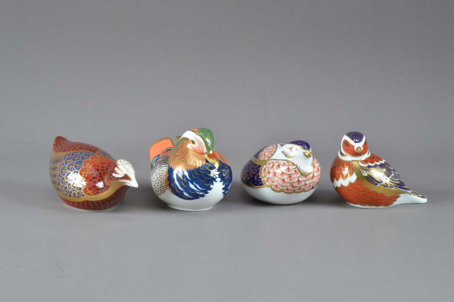 Lot 207 - Four bird Royal Crown Derby bone china paperweights