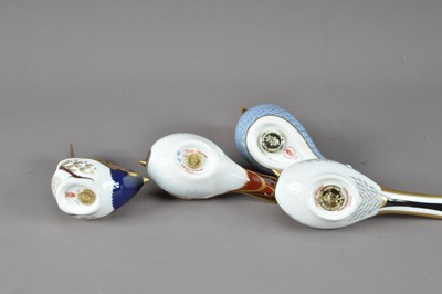 Lot 209 - Four bird Royal Crown Derby bone china paperweights