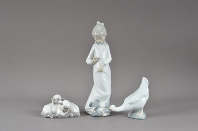 Lot 228 - Two Nao porcelain figurines