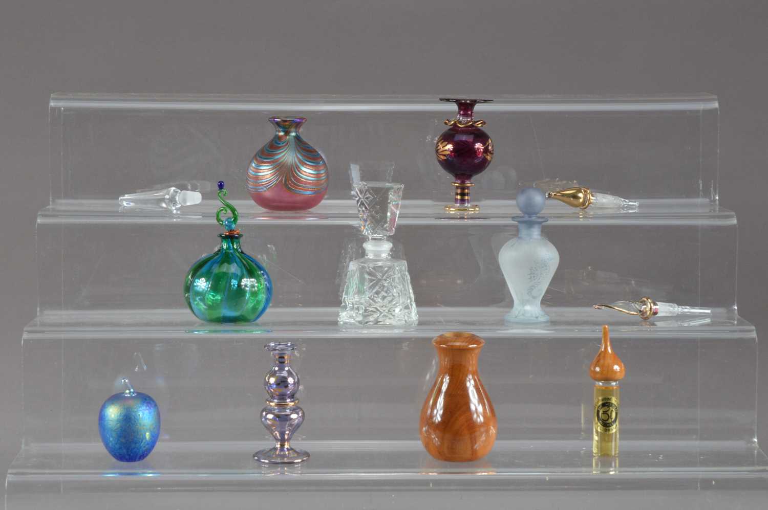 Lot 229 - An assorted collection of glass scent bottles