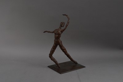 Lot 311 - A cast bronze sculpture of a figure