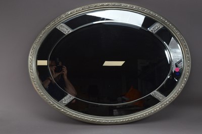 Lot 315 - A modern silvered oval mirror