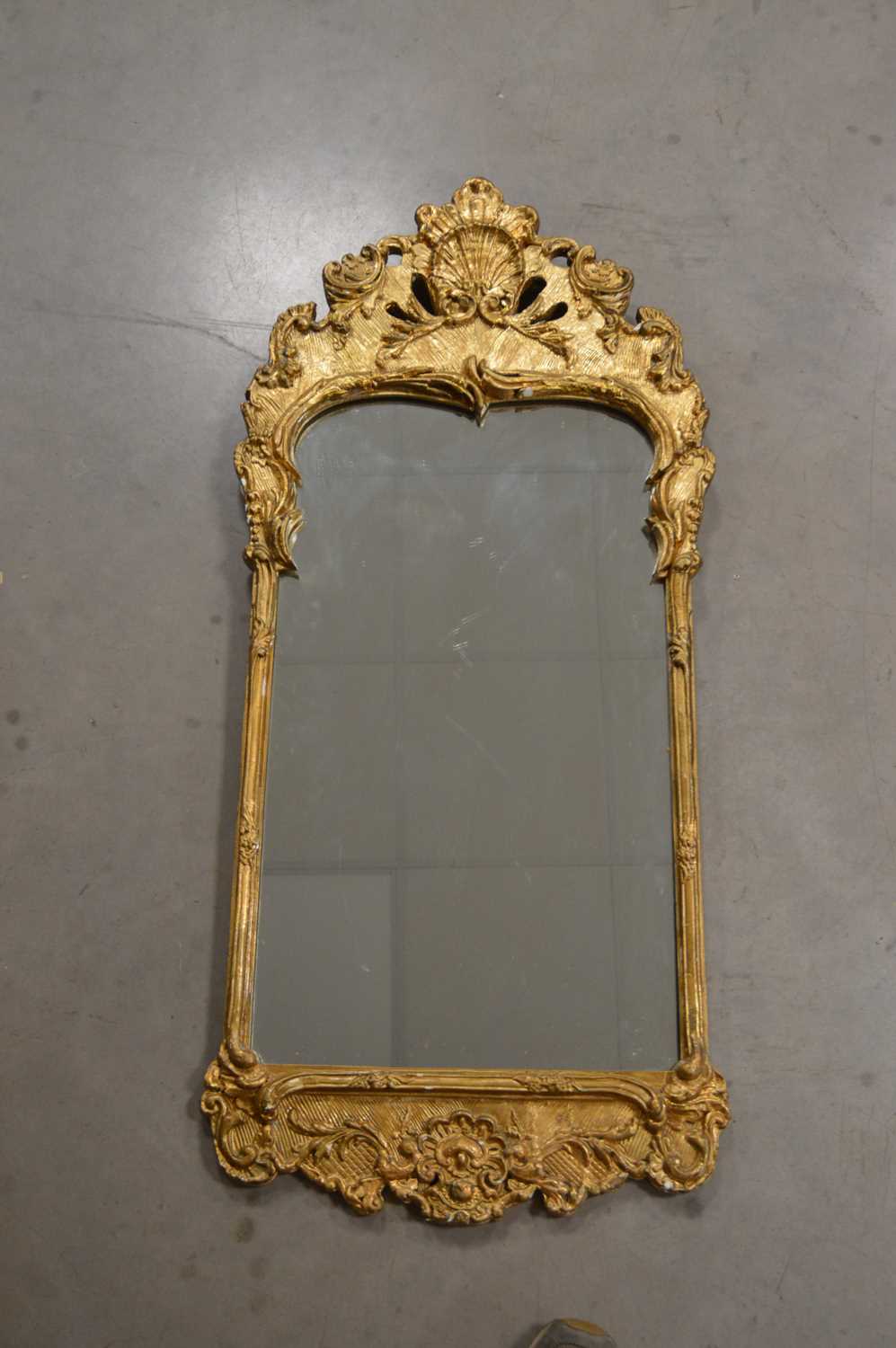 Lot 321 - A decorative frame gilt painted mirror