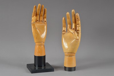 Lot 366 - Two articulated wooden glove hands