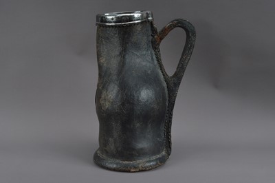 Lot 375 - A 19th century leather and silver-plated jug