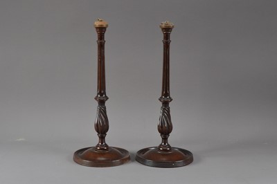Lot 382 - A pair of decorative wooden candlesticks