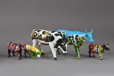 Lot 394 - A collection of cow figurines