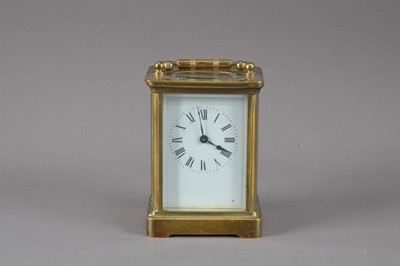 Lot 396 - An early 20th century brass carriage clock