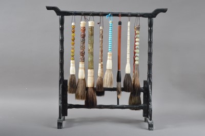 Lot 151 - A set of Chinese calligraphy brushes and stand