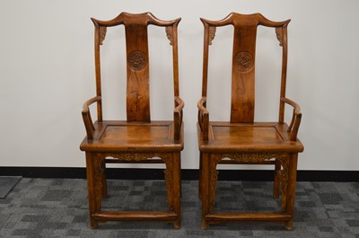 Lot 155 - A pair of impressive Chinese hardwood marriage armchairs