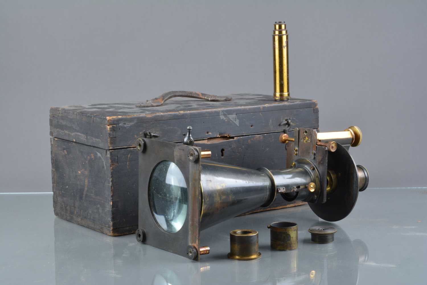 Lot 36 - An early 20th Century Baker oxidised brass Projection Microscope Magic Lantern Attachment