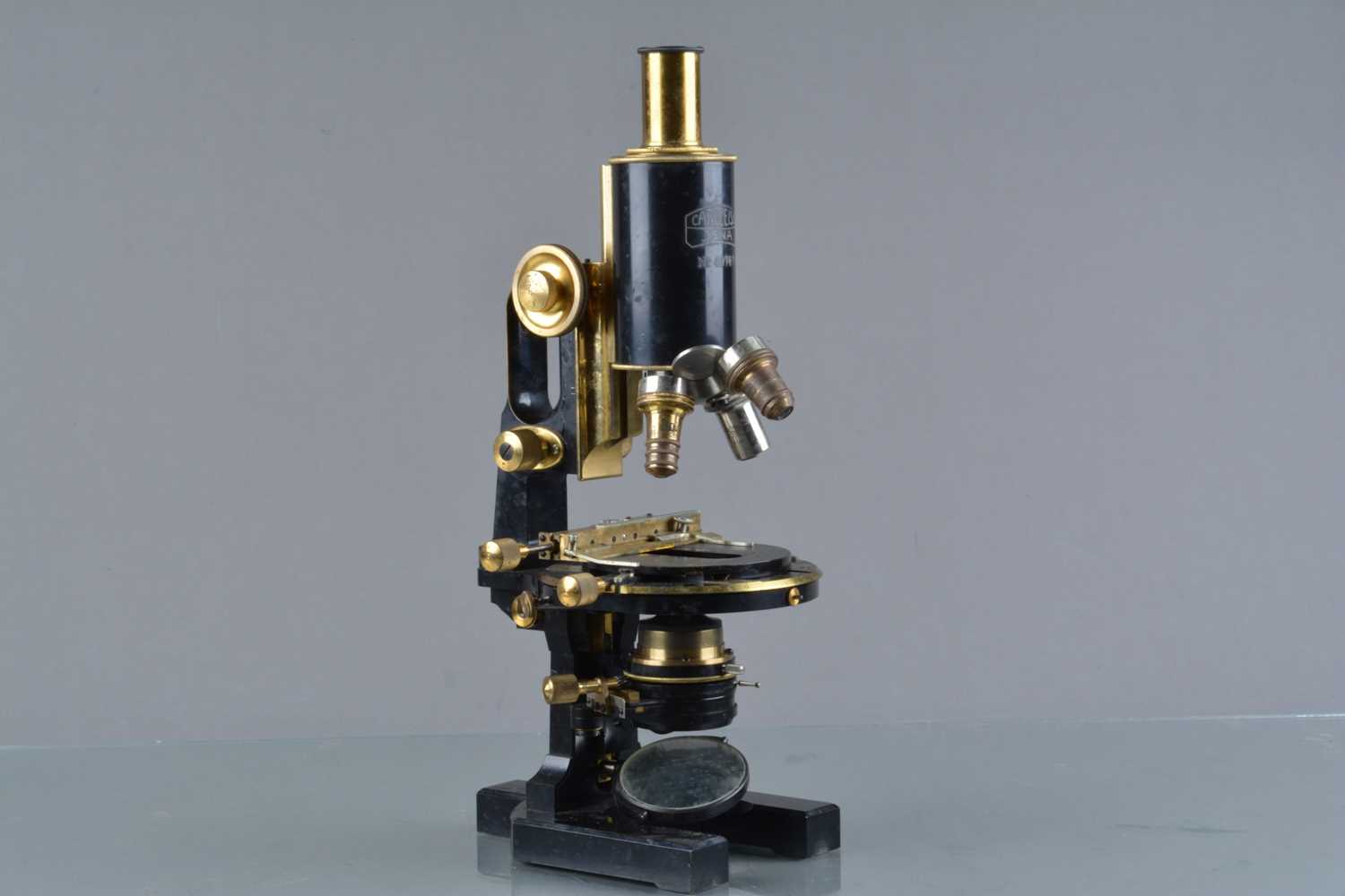 Lot 144 - An early 20th Century black-painted and lacquered brass Carl Zeiss Compound Monocular Microscope