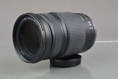 Lot 553 - A Panasonic H-FS100300 Lumix G Vario 100-300mm f/4-5.6 Mega O.I.S. Lens