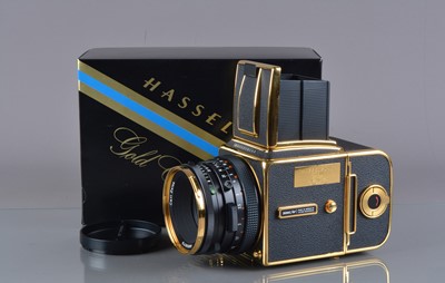 Lot 585 - A Hasselblad 500C/M Gold Exclusive 30th Anniversary Camera