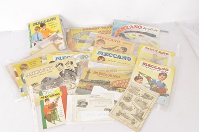 Lot 407 - Meccano Prize Model Catalogue 1914 and various 1935-1962 Meccano Catalogues some Meccano only and others including Dinky Toys Hornby Trains and other toys (24)