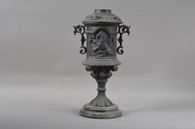 Lot 182 - A cast spelter twin handled urn and cover
