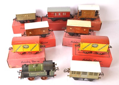 Lot 718 - A Hornby 0 Gauge SR M3 clockwork Locomotive and Goods Stock (9)