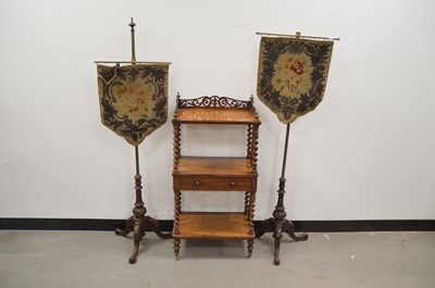 Lot 7 - A Victorian walnut whatnot and two fire side pole screens