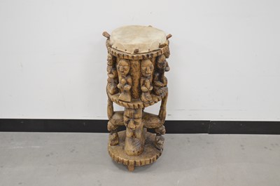 Lot 14 - An African carved wooden tribal drum