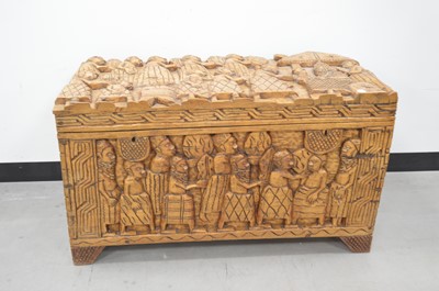 Lot 17 - A modern Nigerian carved wood chest