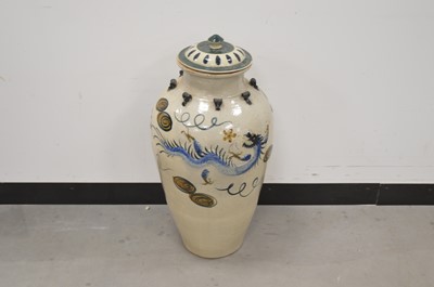 Lot 28 - A large modern Chinese ceramic pot and cover